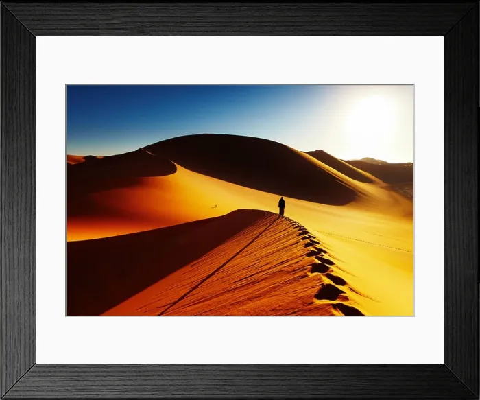 Framed Print : Sand dune climbing at sunrise, Sahara Desert, Algeria Framed Print : Sand dune climbing at sunrise, Sahara Desert, Algeria
