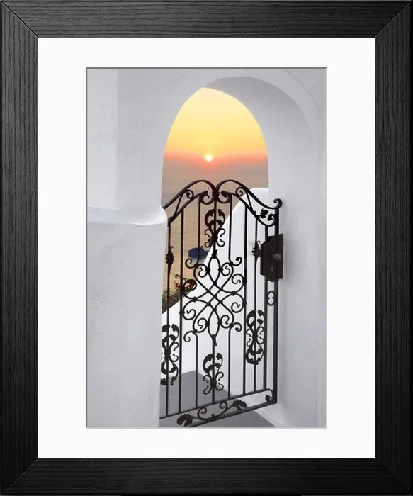 Framed Print : Thira (capital city of Santorini) - doorway with white walls and the sunset in the background, Santorini Island, Greece Framed Print : Thira (capital city of Santorini) - doorway with white walls and the sunset in the background, Santorini Island, Greece