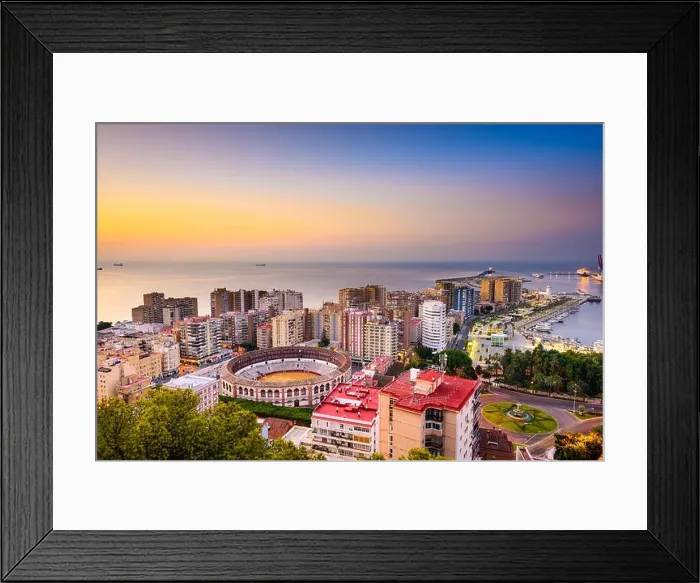 Framed Print : Malaga, Spain dawn skyline towards the Mediterranean Sea Framed Print : Malaga, Spain dawn skyline towards the Mediterranean Sea