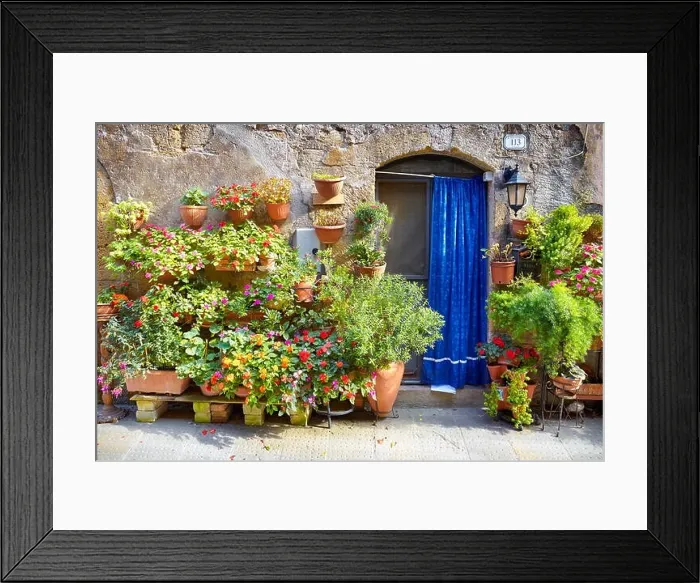 Framed Print : City street decorated with flowers, Pitigliano, Tuscany, Italy Framed Print : City street decorated with flowers, Pitigliano, Tuscany, Italy