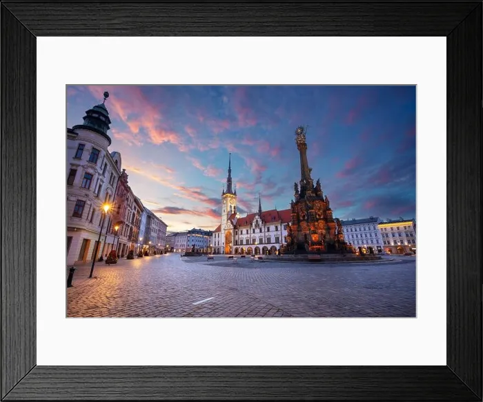 Framed Print : Olomouc, Czech Republic. Cityscape image of downtown Olomouc, Czech Republic with Olomouc City Hall and Honorary Holy Trinity Column at summer sunris Framed Print : Olomouc, Czech Republic. Cityscape image of downtown Olomouc, Czech Republic with Olomouc City Hall and Honorary Holy Trinity Column at summer sunris
