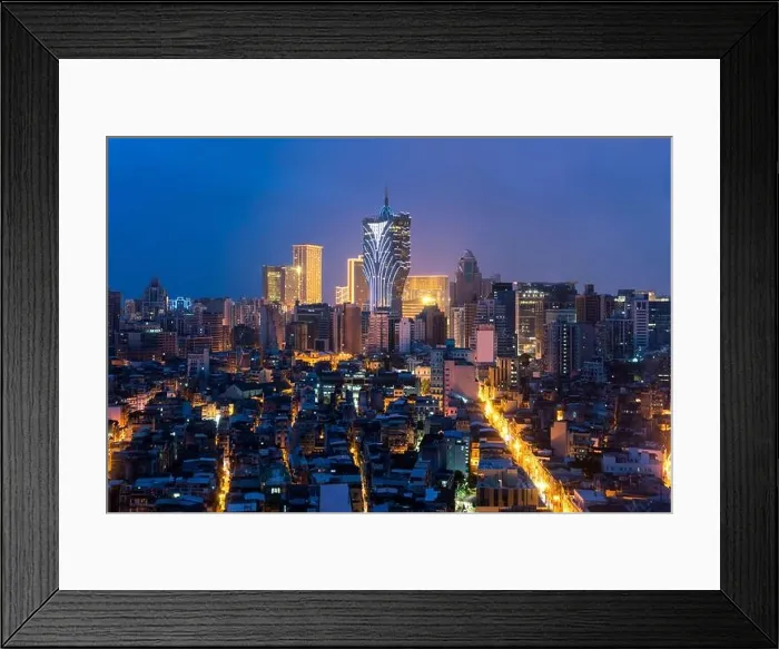 Framed Print : Image of Macau (Macao), China. Skyscraper hotel and casino building at downtown in Macau (Macao). Asian tourism, modern city life, or business finance Framed Print : Image of Macau (Macao), China. Skyscraper hotel and casino building at downtown in Macau (Macao). Asian tourism, modern city life, or business finance
