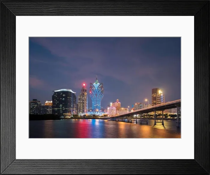 Framed Print : Image of Macau (Macao), China. Skyscraper hotel and casino building at downtown in Macau (Macao). Asian tourism, modern city life, or business finance Framed Print : Image of Macau (Macao), China. Skyscraper hotel and casino building at downtown in Macau (Macao). Asian tourism, modern city life, or business finance