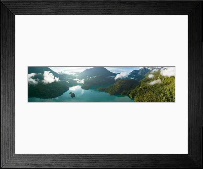 Framed Print : Rugged, forest-covered landscape surrounds Diablo Lake in North Cascades National Park. This mountainous region in Washington is absolutely beautiful Framed Print : Rugged, forest-covered landscape surrounds Diablo Lake in North Cascades National Park. This mountainous region in Washington is absolutely beautiful