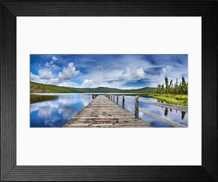 Framed Print : Beautiful mountain lake with reflection and wooden pier. Fluffy white clouds and blue sky reflected in still water Framed Print : Beautiful mountain lake with reflection and wooden pier. Fluffy white clouds and blue sky reflected in still water