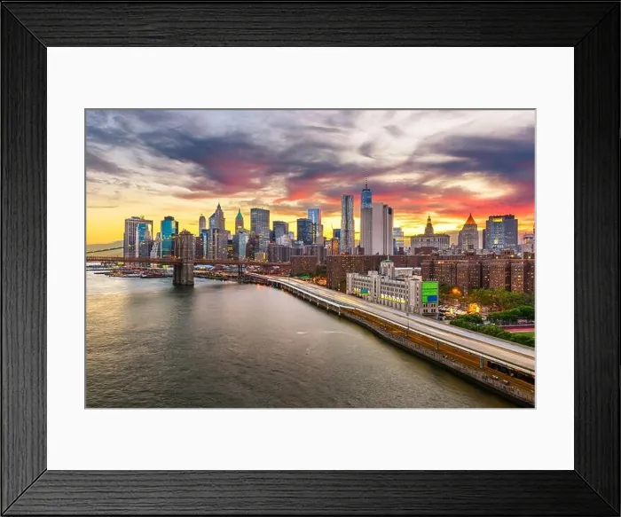 Framed Print : New York, New York, USA downtown Manhattan city skyline over the East River with the Brooklyn Bridge at dusk Framed Print : New York, New York, USA downtown Manhattan city skyline over the East River with the Brooklyn Bridge at dusk