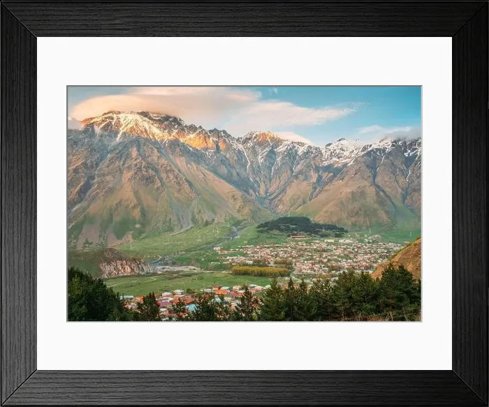 Framed Print : Stepantsminda Village At Sunny Evening Sunset In Kazbegi District, Mtskheta-Mtianeti Region, Georgia. Spring Summer Season Mountains Landscape Framed Print : Stepantsminda Village At Sunny Evening Sunset In Kazbegi District, Mtskheta-Mtianeti Region, Georgia. Spring Summer Season Mountains Landscape