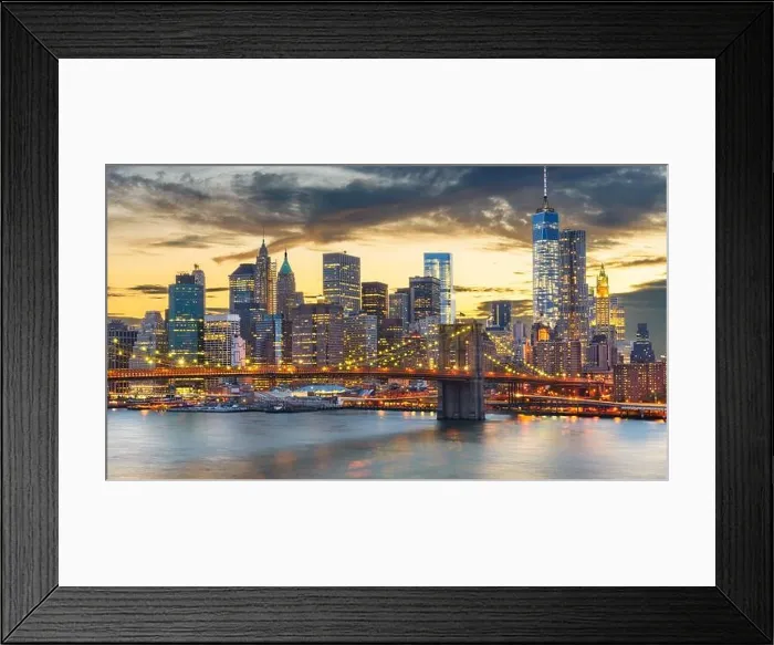 Framed Print : New York, New York, USA downtown Manhattan city skyline over the East River with the Brooklyn Bridge at dusk Framed Print : New York, New York, USA downtown Manhattan city skyline over the East River with the Brooklyn Bridge at dusk