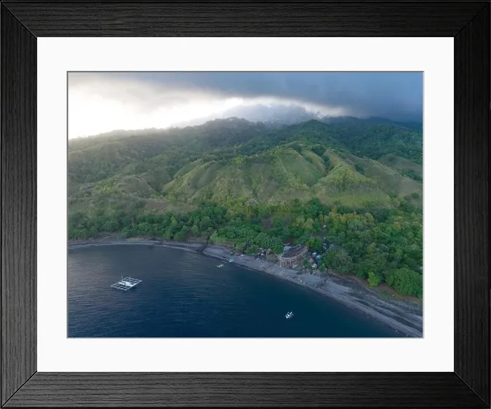 Framed Print : Clouds drift across the remote, volcanic island of Sangeang as it rises from the impressive seascape near Komodo National Park, Indonesia Framed Print : Clouds drift across the remote, volcanic island of Sangeang as it rises from the impressive seascape near Komodo National Park, Indonesia