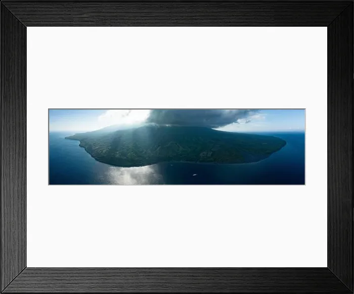 Framed Print : The remote, volcanic island of Sangeang rises from the seascape near Komodo National Park, Indonesia. This island is known for its black sand habitat Framed Print : The remote, volcanic island of Sangeang rises from the seascape near Komodo National Park, Indonesia. This island is known for its black sand habitat