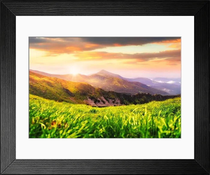 Framed Print : Summer mountain landscape in Carpathians. Green grass and mountains range on background. Incredible sunrise in national nature park Framed Print : Summer mountain landscape in Carpathians. Green grass and mountains range on background. Incredible sunrise in national nature park