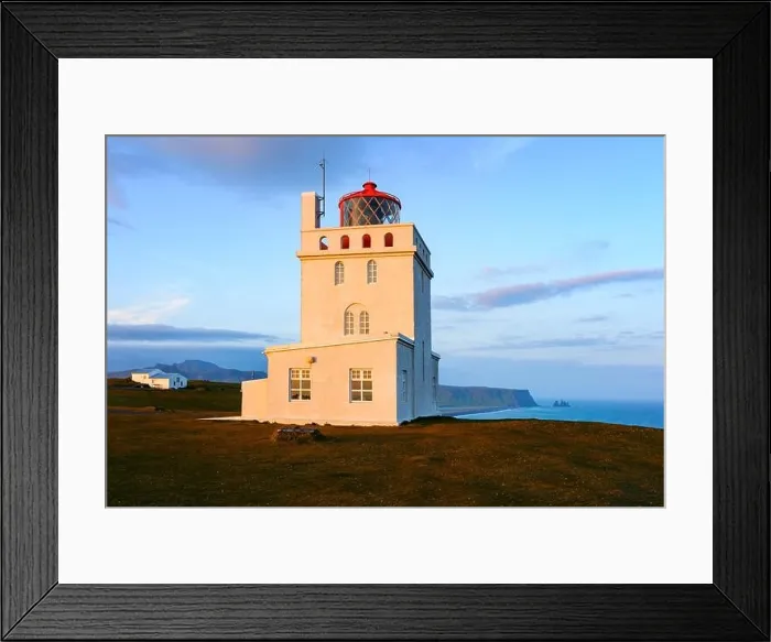 Framed Print : Gorgeous landscape with white lighthouse at Cape Dyrholaey, located on south coast of Atlantic ocean in Iceland Framed Print : Gorgeous landscape with white lighthouse at Cape Dyrholaey, located on south coast of Atlantic ocean in Iceland