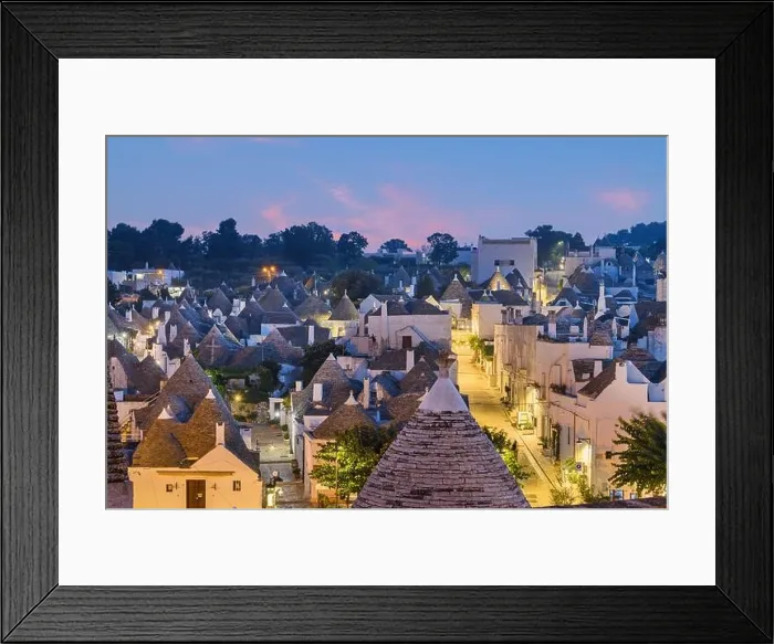 Framed Print : Alberobello, Italy with Trulli houses at dusk Framed Print : Alberobello, Italy with Trulli houses at dusk