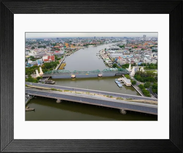 Framed Print : Aerial shots taken from a drone of Phra Pok Klao Bridge and Phra Phuttha Yot Fa Bridge. crossing the Chao Phraya River in the morning with temple Framed Print : Aerial shots taken from a drone of Phra Pok Klao Bridge and Phra Phuttha Yot Fa Bridge. crossing the Chao Phraya River in the morning with temple