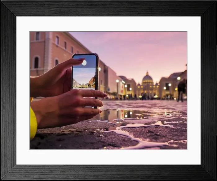 Framed Print : Young woman traveler tourist taking beautiful landscape photo of european sunset during holiday vacation Framed Print : Young woman traveler tourist taking beautiful landscape photo of european sunset during holiday vacation
