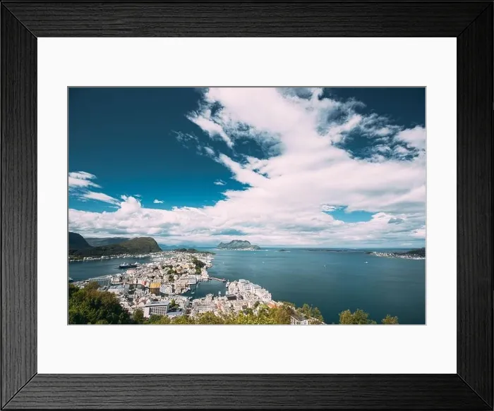 Framed Print : Alesund, Norway. Amazing Natural Bright Sunset Dramatic Sky In Warm Colours Above Alesund Islands. Famous Norwegian Landmark And Popular Destination Framed Print : Alesund, Norway. Amazing Natural Bright Sunset Dramatic Sky In Warm Colours Above Alesund Islands. Famous Norwegian Landmark And Popular Destination