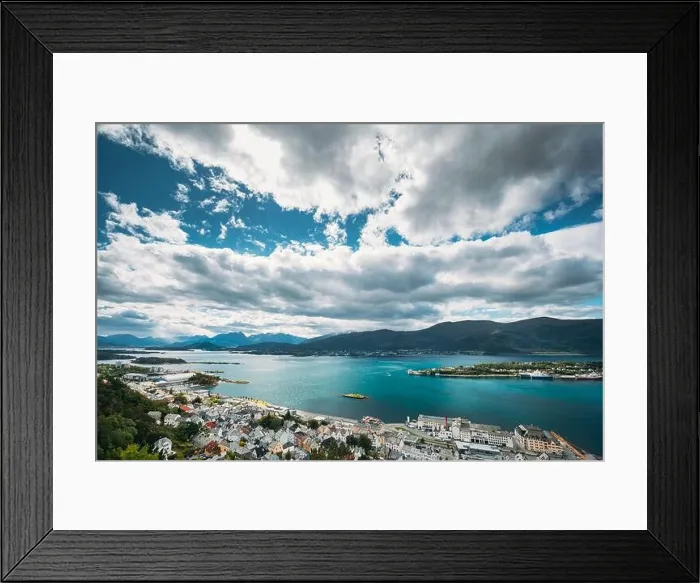 Framed Print : Alesund, Norway. Amazing Natural Bright Sunset Dramatic Sky In Warm Colours Above Alesund Islands. Famous Norwegian Landmark And Popular Destination Framed Print : Alesund, Norway. Amazing Natural Bright Sunset Dramatic Sky In Warm Colours Above Alesund Islands. Famous Norwegian Landmark And Popular Destination