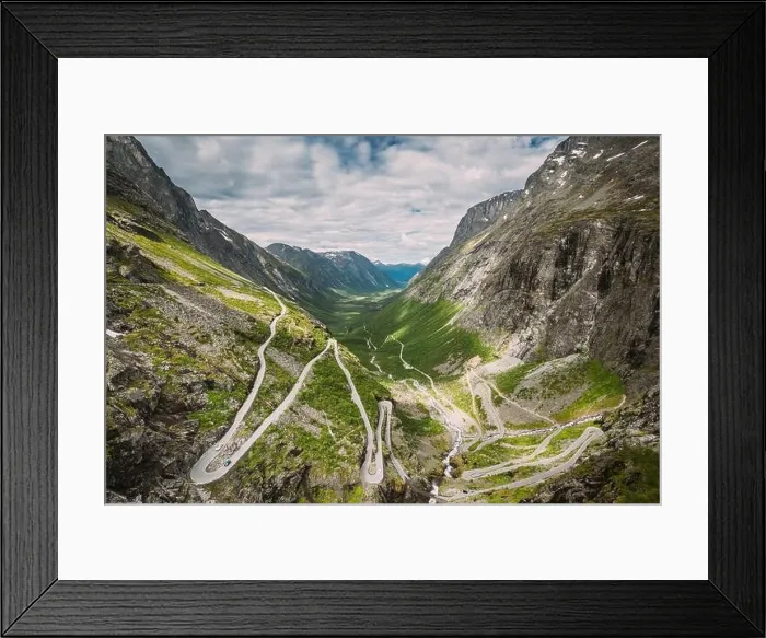 Framed Print : Trollstigen, Andalsnes, Norway. Cars Goes On Serpentine Mountain Road Trollstigen. Famous Norwegian Landmark And Popular Destination. Norwegian County Framed Print : Trollstigen, Andalsnes, Norway. Cars Goes On Serpentine Mountain Road Trollstigen. Famous Norwegian Landmark And Popular Destination. Norwegian County