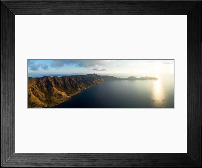 Framed Print : Evening sunlight illuminates the volcanic island of Gili Banta near Komodo, Indonesia. This tropical area is home to extraordinary marine Framed Print : Evening sunlight illuminates the volcanic island of Gili Banta near Komodo, Indonesia. This tropical area is home to extraordinary marine