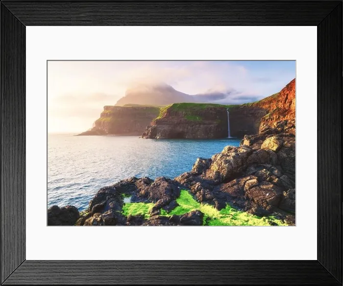 Framed Print : Incredible view of Mulafossur waterfall in Gasadalur village, Vagar Island of the Faroe Islands, Denmark. Landscape photography Framed Print : Incredible view of Mulafossur waterfall in Gasadalur village, Vagar Island of the Faroe Islands, Denmark. Landscape photography
