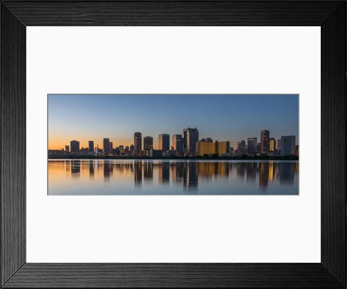 Framed Print : Osaka, Japan skyline at Umeda from across the Yodogawa River in the early morning Framed Print : Osaka, Japan skyline at Umeda from across the Yodogawa River in the early morning