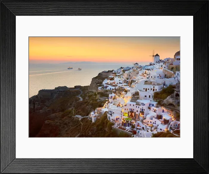Framed Print : View of Oia Town and windmills at sunset time, Oia, Santorini Island, Greece Framed Print : View of Oia Town and windmills at sunset time, Oia, Santorini Island, Greece