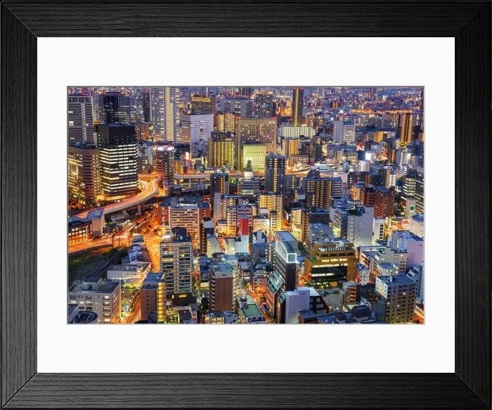 Framed Print : Osaka, Japan cityscape with dense architecture in the Umeda District at night Framed Print : Osaka, Japan cityscape with dense architecture in the Umeda District at night