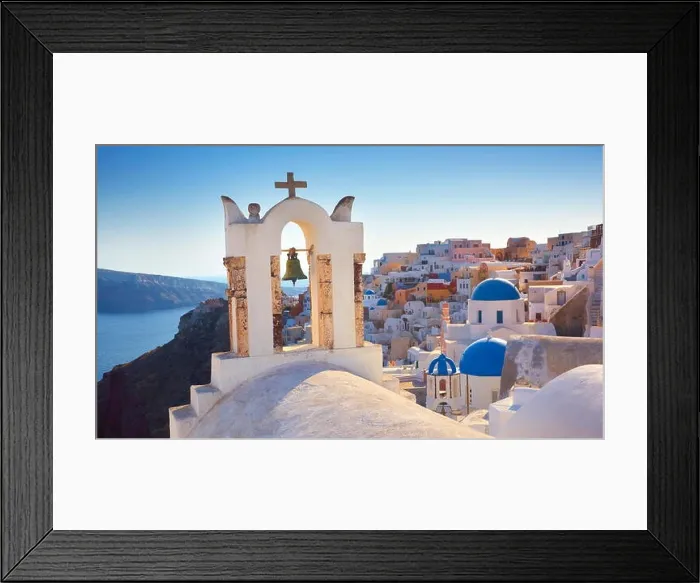Framed Print : Santorini Island - greek church, bell tower and white houses in the background - Oia Town, Greece Framed Print : Santorini Island - greek church, bell tower and white houses in the background - Oia Town, Greece