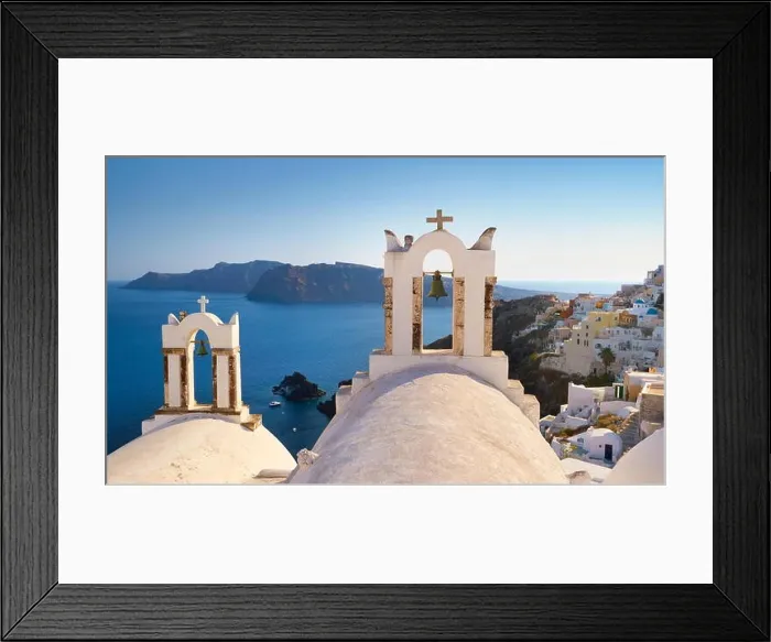 Framed Print : Santorini landscape with white bell tower of church and sea in the background - Oia Town, Santorini Island, Cyclades, Greece Framed Print : Santorini landscape with white bell tower of church and sea in the background - Oia Town, Santorini Island, Cyclades, Greece