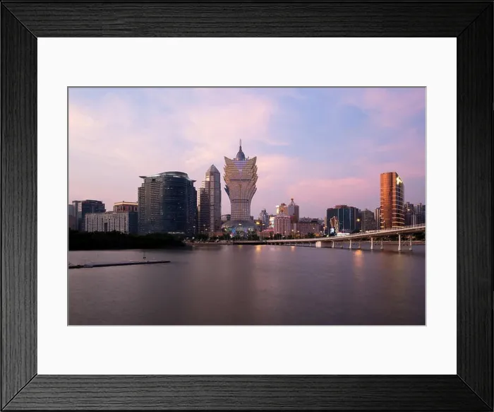 Framed Print : Image of Macau (Macao), China. Skyscraper hotel and casino building at downtown in Macau (Macao). Asian tourism, modern city life, or business finance Framed Print : Image of Macau (Macao), China. Skyscraper hotel and casino building at downtown in Macau (Macao). Asian tourism, modern city life, or business finance