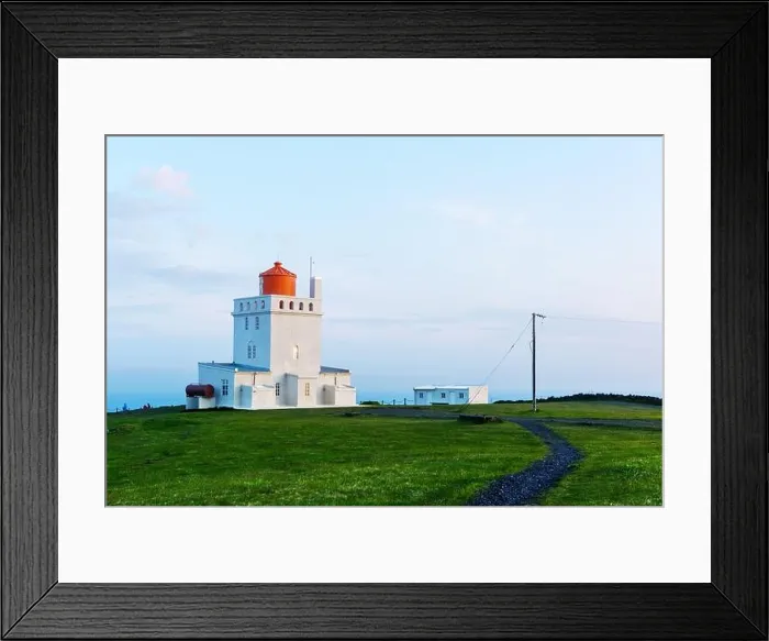 Framed Print : Landscape with white lighthouse at Cape Dyrholaey, located on south coast of Atlantic ocean in Iceland Framed Print : Landscape with white lighthouse at Cape Dyrholaey, located on south coast of Atlantic ocean in Iceland