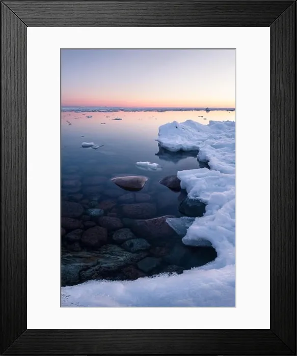 Framed Print : Tranquil winter sunset with melt sea and clean snow at beautiful peaceful evening in Finland Framed Print : Tranquil winter sunset with melt sea and clean snow at beautiful peaceful evening in Finland