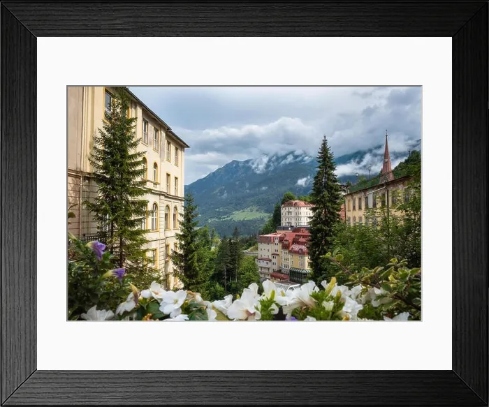 Framed Print : Beautiful cityscape with flowers and mountains at cloudy summer day in idyllic alp village Bad Gastein, Austria Framed Print : Beautiful cityscape with flowers and mountains at cloudy summer day in idyllic alp village Bad Gastein, Austria