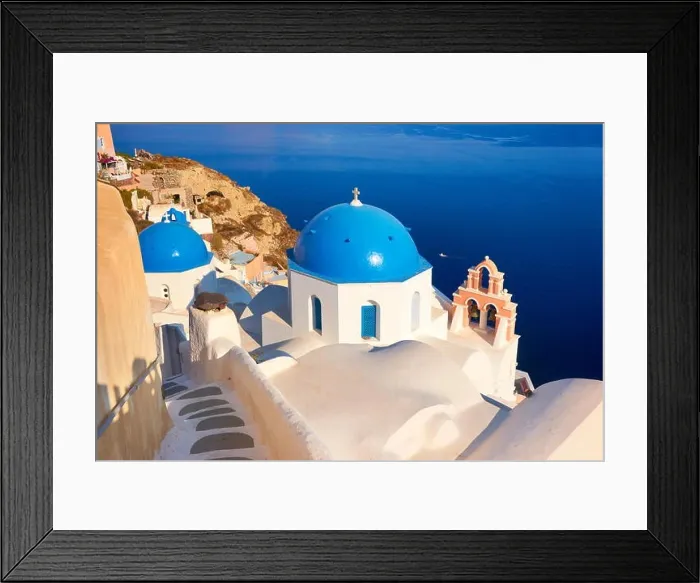 Framed Print : Popular Santorini Caldera landscape with greek white church overlooking the sea, Oia Town, Santorini Island, Greece Framed Print : Popular Santorini Caldera landscape with greek white church overlooking the sea, Oia Town, Santorini Island, Greece