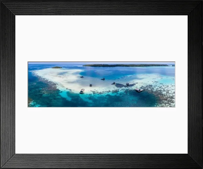 Framed Print : Fishing shacks are built on a remote reef in the Molucca Sea, Indonesia. This tropical region is known as the heart of the Coral Triangle Framed Print : Fishing shacks are built on a remote reef in the Molucca Sea, Indonesia. This tropical region is known as the heart of the Coral Triangle
