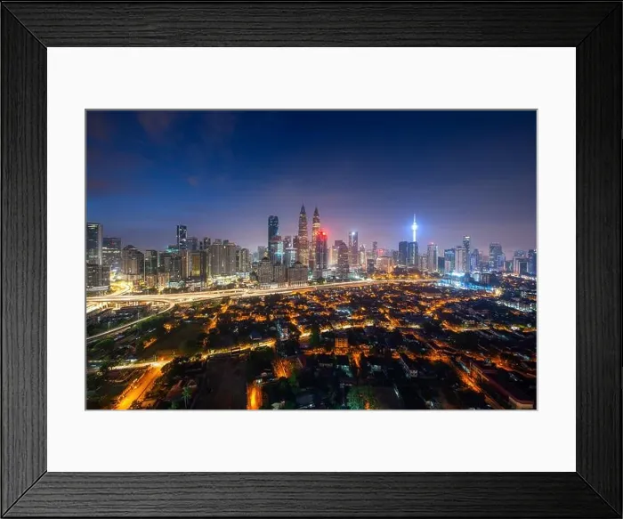 Framed Print : Kuala Lumpur city skyscraper and street with nice sky twilight at downtown business district in Kuala Lumpur. Malaysia. Malaysia tourism, modern city