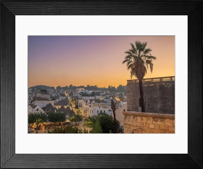 Framed Print : Alberobello, Italy with Trulli houses at dusk Framed Print : Alberobello, Italy with Trulli houses at dusk