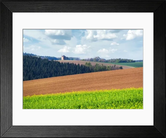 Framed Print : Picturesque rural landscape with old windmill and green and brown sunny spring hills. South Moravia region, Czech Republic Framed Print : Picturesque rural landscape with old windmill and green and brown sunny spring hills. South Moravia region, Czech Republic