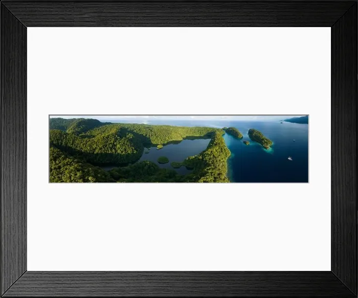 Framed Print : A large marine lake is found within beautiful limestone islands that rise from West Papua's seascape. Marine lakes are enclosed saltwater ecosystems Framed Print : A large marine lake is found within beautiful limestone islands that rise from West Papua's seascape. Marine lakes are enclosed saltwater ecosystems