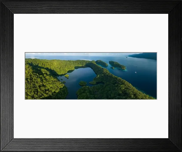 Framed Print : A large marine lake is found within beautiful limestone islands that rise from West Papua's seascape. Marine lakes are enclosed saltwater ecosystems Framed Print : A large marine lake is found within beautiful limestone islands that rise from West Papua's seascape. Marine lakes are enclosed saltwater ecosystems