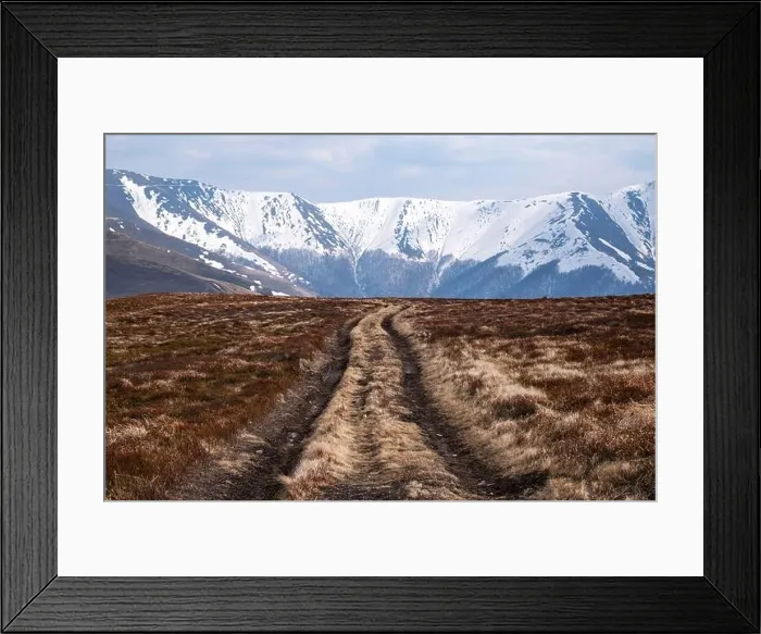 Framed Print : Amazing scene on spring mountains. Yellow grass and rural road with snowy hills on background. Carpathians, Europe. Landscape photography Framed Print : Amazing scene on spring mountains. Yellow grass and rural road with snowy hills on background. Carpathians, Europe. Landscape photography