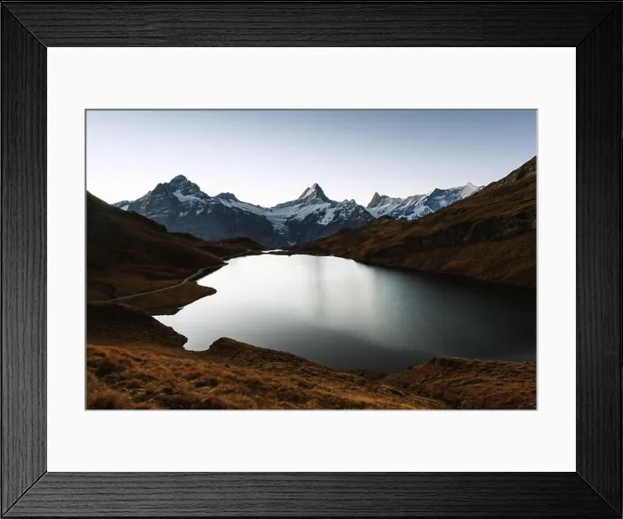 Framed Print : Picturesque view on Bachalpsee lake in Swiss Alps mountains. Snowy peaks of Wetterhorn, Mittelhorn and Rosenhorn on background Framed Print : Picturesque view on Bachalpsee lake in Swiss Alps mountains. Snowy peaks of Wetterhorn, Mittelhorn and Rosenhorn on background