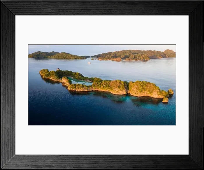 Framed Print : The beautiful rock islands found in Raja Ampat, Indonesia, are ancient coral reefs that were uplifted by tectonic events millions of years ago Framed Print : The beautiful rock islands found in Raja Ampat, Indonesia, are ancient coral reefs that were uplifted by tectonic events millions of years ago