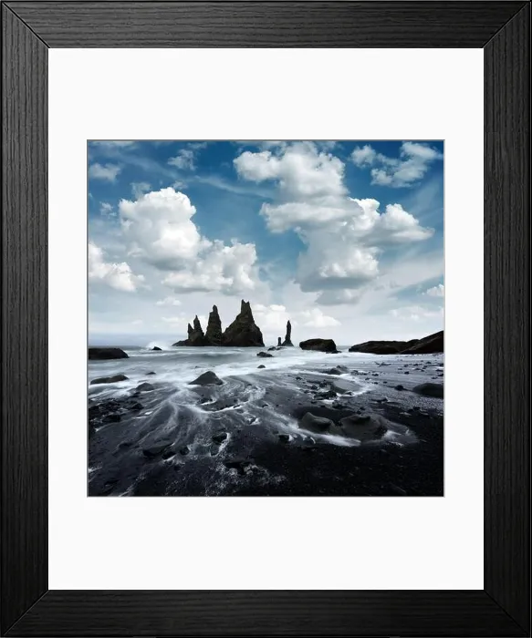 Framed Print : Amazing landscape with basalt rock formations Troll Toes on Black beach, stormy ocean waves and cloudscape. Reynisdrangar, Vik, Iceland
