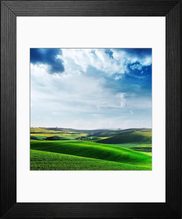 Framed Print : Picturesque rural landscape with green agricultural fields, spring hills and blue sky. South Moravia region, Czech Republic Framed Print : Picturesque rural landscape with green agricultural fields, spring hills and blue sky. South Moravia region, Czech Republic
