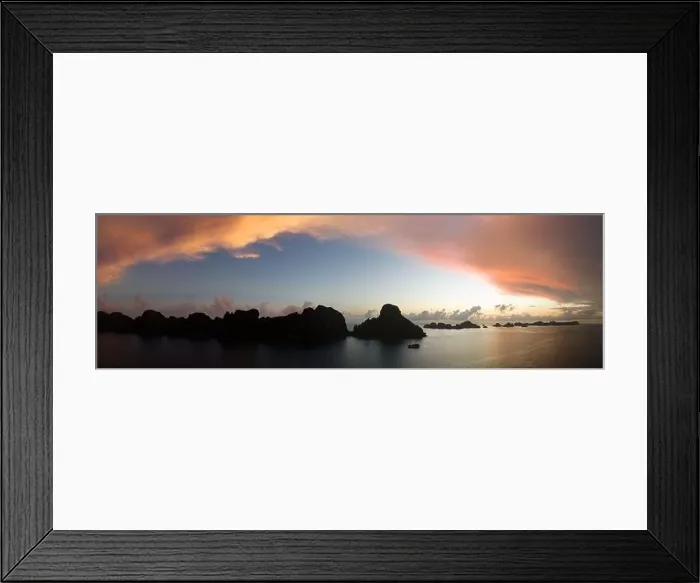 Framed Print : Sunrise illuminates dramatic limestone islands that rise from Raja Ampat's beautiful seascape. This area is known for its high marine biodiversity Framed Print : Sunrise illuminates dramatic limestone islands that rise from Raja Ampat's beautiful seascape. This area is known for its high marine biodiversity