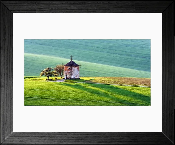 Framed Print : Gorgeous rural landscape with old windmill and green sunny spring hills. South Moravia region, Czech Republic Framed Print : Gorgeous rural landscape with old windmill and green sunny spring hills. South Moravia region, Czech Republic