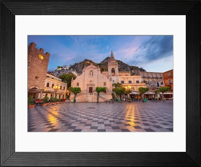Framed Print : Taormina, Sicily, Italy. Cityscape image of picturesque town of Taormina, Sicily with main square Piazza IX Aprile and San Giuseppe church at sunrise Framed Print : Taormina, Sicily, Italy. Cityscape image of picturesque town of Taormina, Sicily with main square Piazza IX Aprile and San Giuseppe church at sunrise