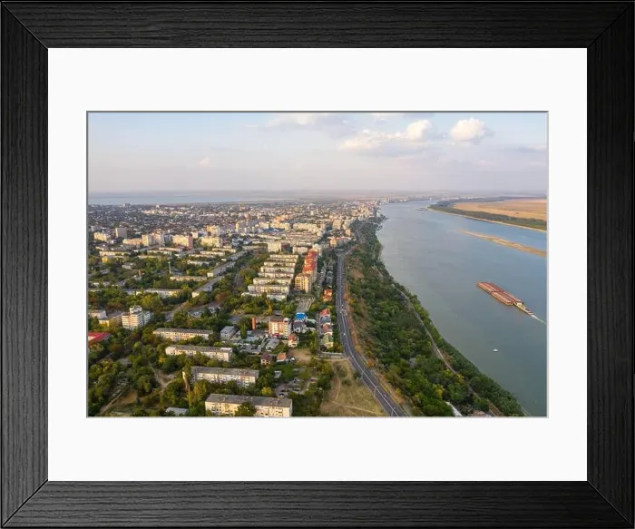 Framed Print : Aerial view of Galati City, Romania. Danube River near city with sunset warm light Framed Print : Aerial view of Galati City, Romania. Danube River near city with sunset warm light