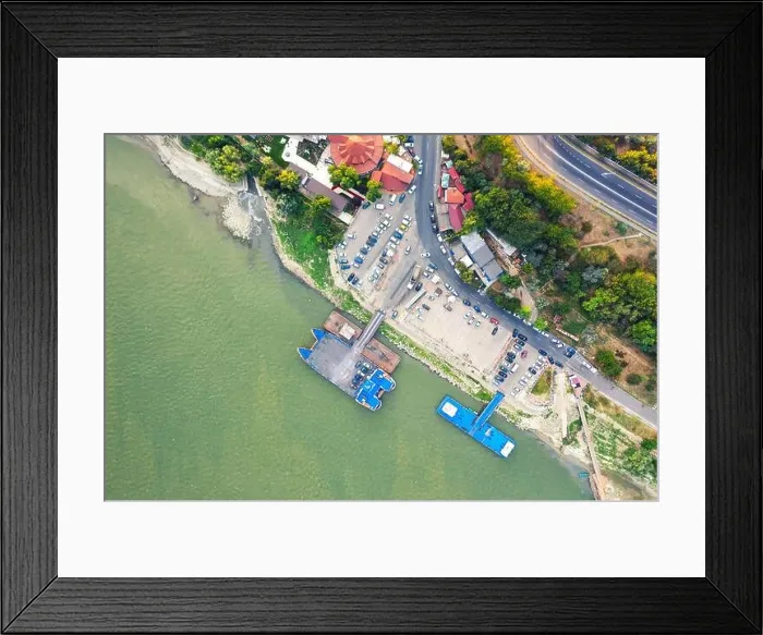 Framed Print : Aerial view of Galati City, Romania. Danube River near city with sunset warm light Framed Print : Aerial view of Galati City, Romania. Danube River near city with sunset warm light